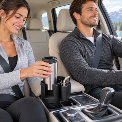 Porte gobelet voiture utilitaire femme dépose café et son téléphone homme conduit en montagne