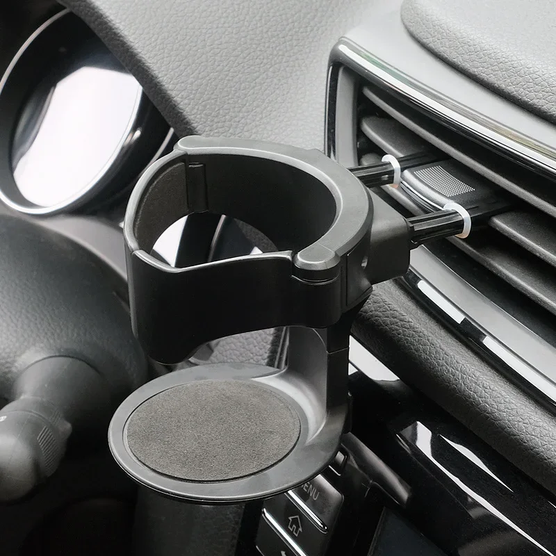 Porte gobelet voiture plastique noir ancré grille ventilation au centre du véhicule
