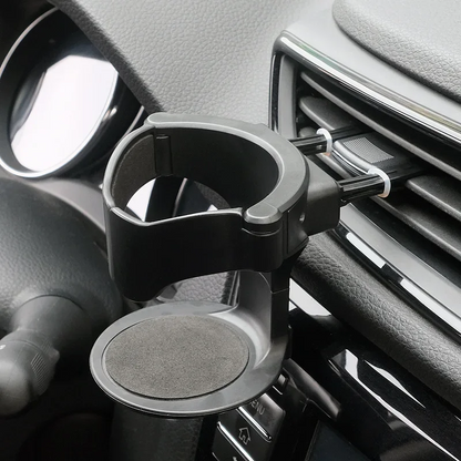 Porte gobelet voiture plastique noir ancré grille ventilation au centre du véhicule