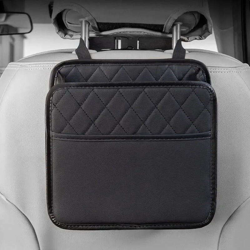 Organisateur de voiture compact noir, suspendu à l'appui-tête derrière le siège du passager.