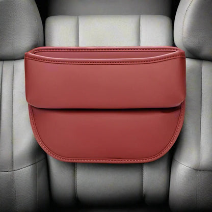 Organisateur de voiture rouge, à placer entre le siège et la console centrale.