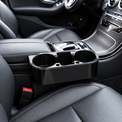 porte gobelet voiture universel noir entre console siège