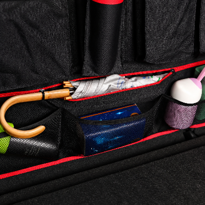 Rangement coffre voiture pochette inférieur montrée